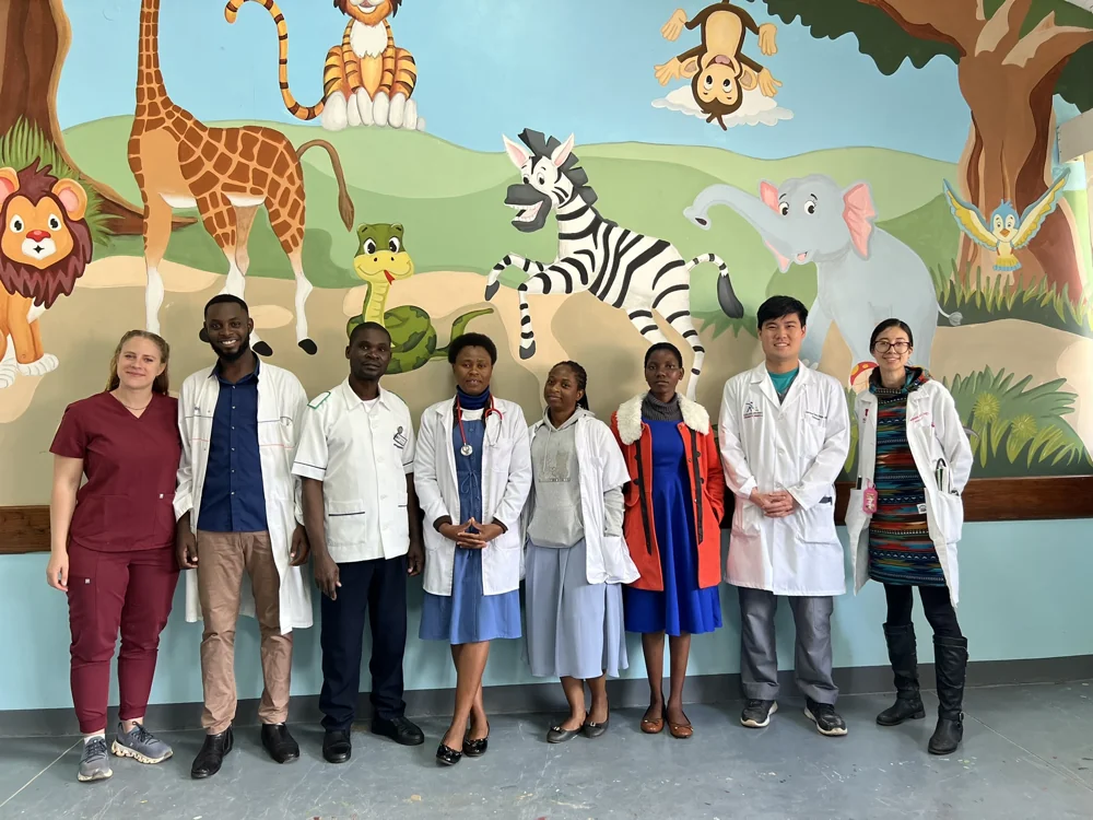 Colleagues together on the Malamulo campus